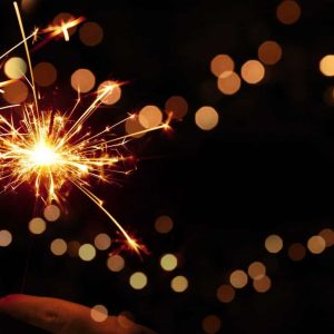 Burning sparklers for the new year festival. Background for christmas or New Year's Eve.