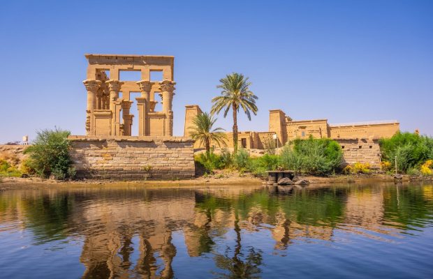 The beautiful temple of Philae and the Greco-Roman buildings seen from the Nile river, a temple dedicated to Isis, goddess of love. Aswan. Egyptian