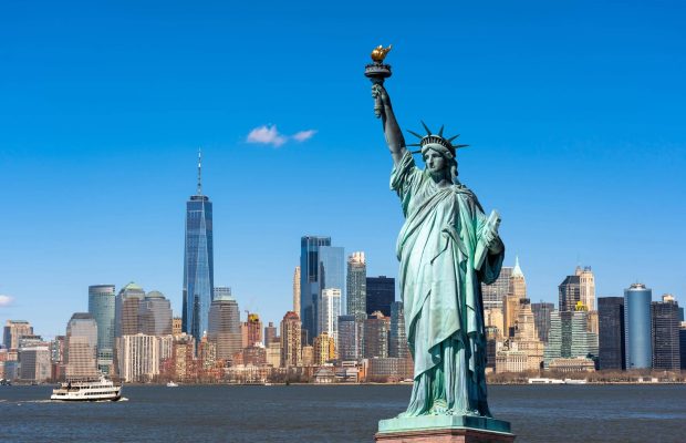 The Statue of Liberty over the Scene of New york cityscape river side which location is lower manhattan,Architecture and building with tourist concept