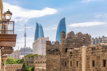 Fortress walls of the old city, Flame towers and TV tower in Baku