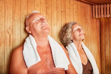 Senior couple enjoys spa sauna