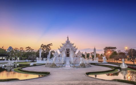 Evening view of Wat Rong Khun or White Temple, Landmark in Chiang Rai, Thailand